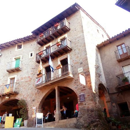 Hotel CAN MENCIÓ - Plaça Major à Santa Pau Extérieur photo