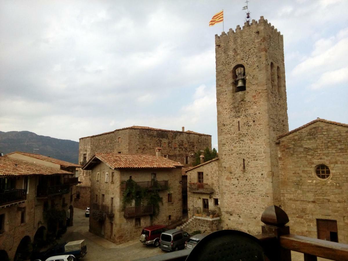 Hotel CAN MENCIÓ - Plaça Major à Santa Pau Extérieur photo