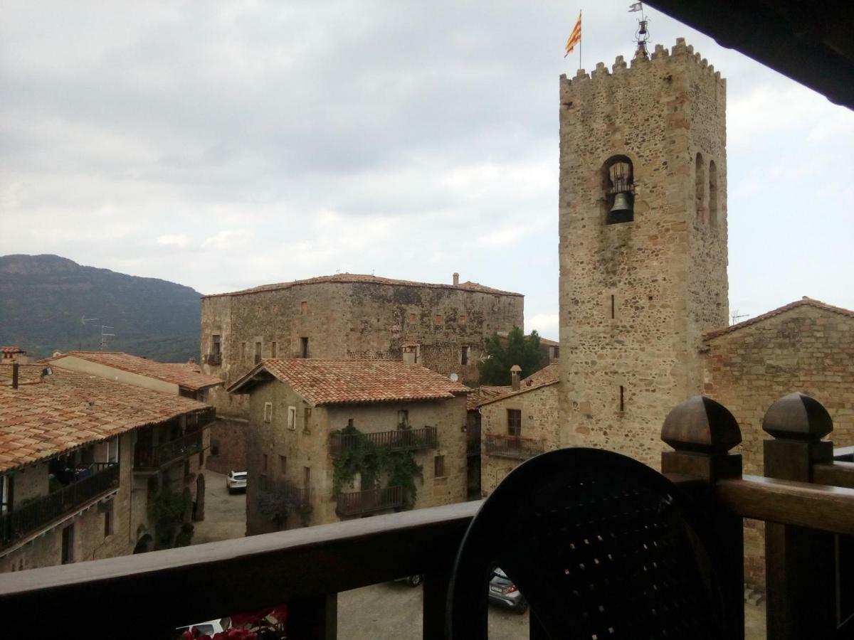 Hotel CAN MENCIÓ - Plaça Major à Santa Pau Extérieur photo